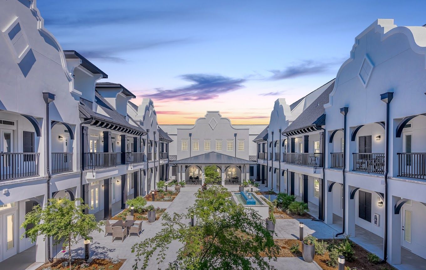 Exterior view of a senior living community with courtyard