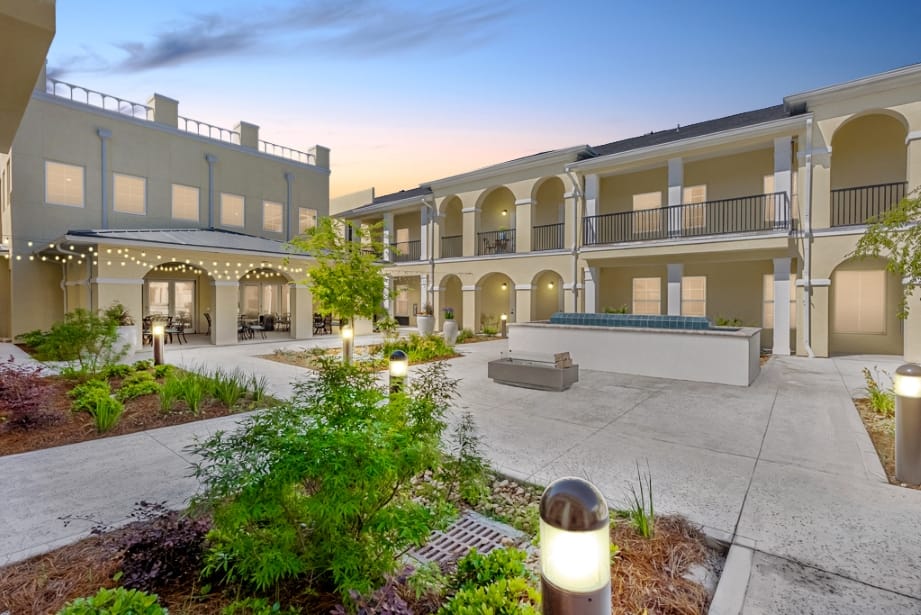 Outdoor courtyard with landscaping and seating areas