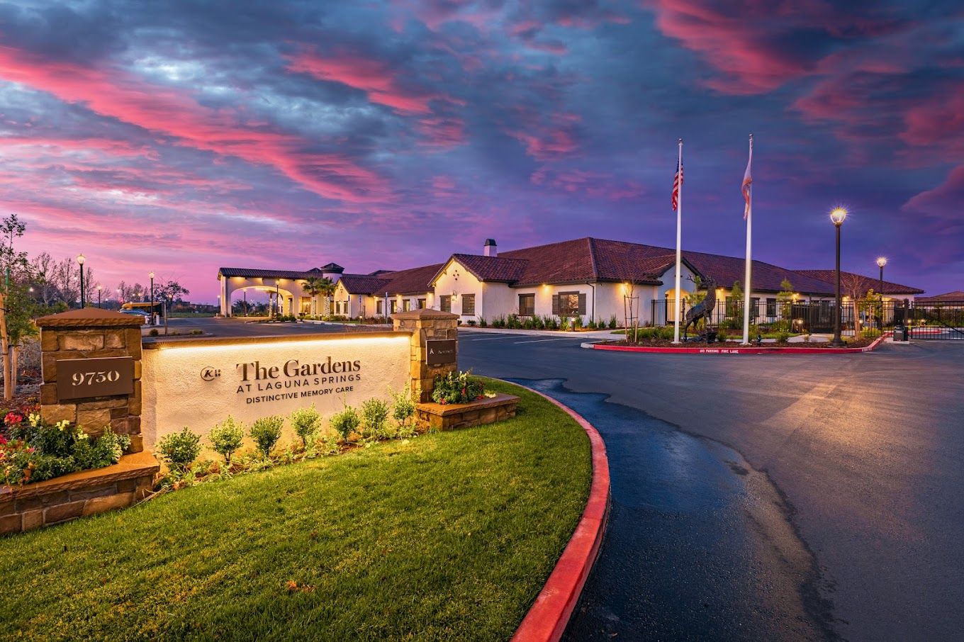 Exterior view of The Gardens at Laguna Springs at sunset