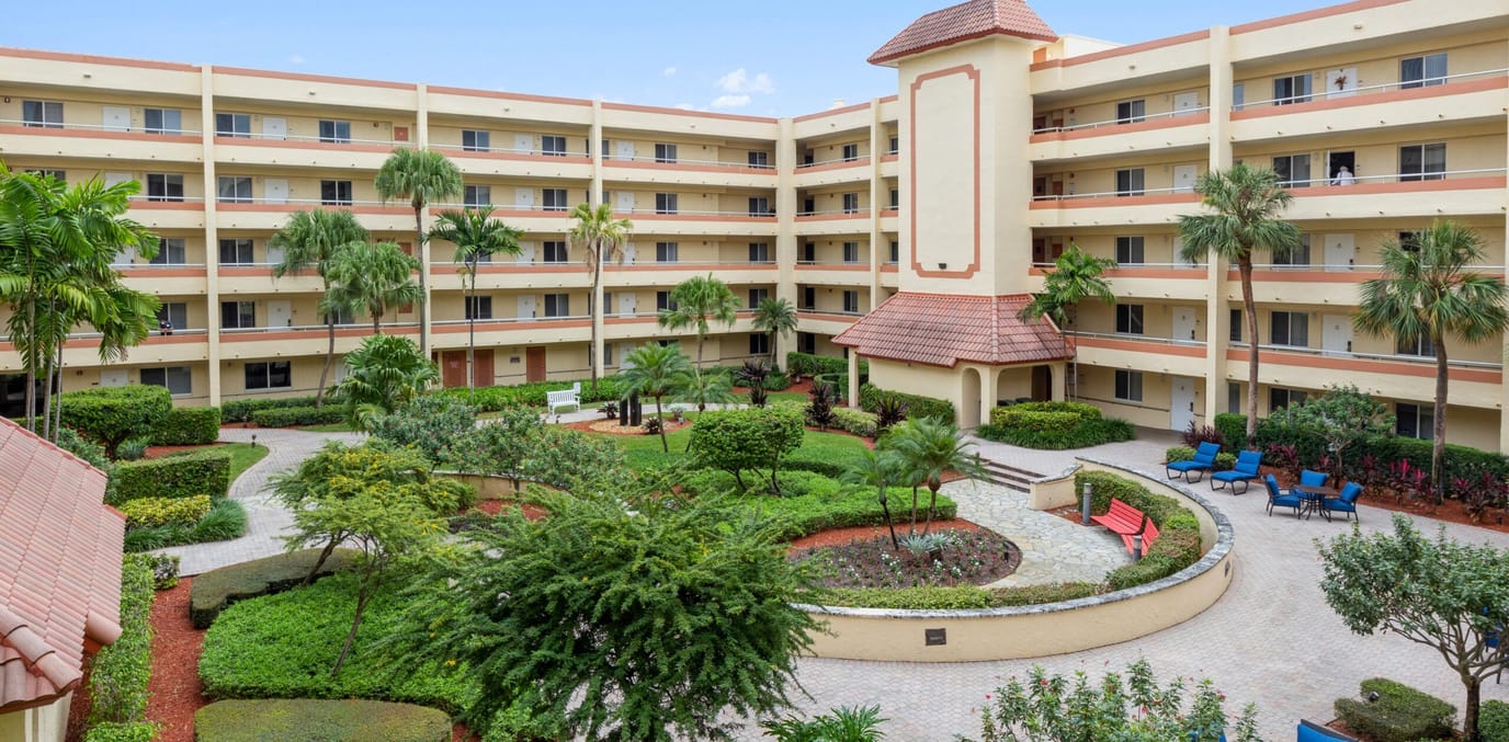 Aerial view of a landscaped courtyard surrounded by buildings