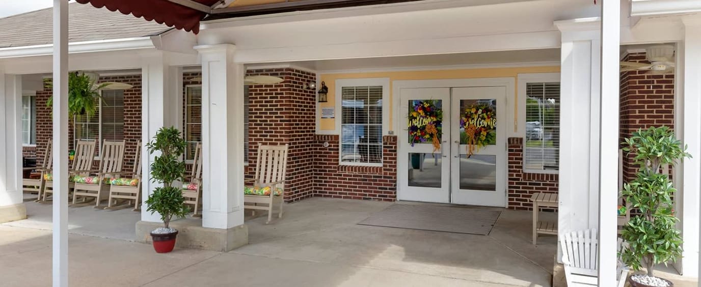 Front entrance of Brookdale Country Day Road with seating