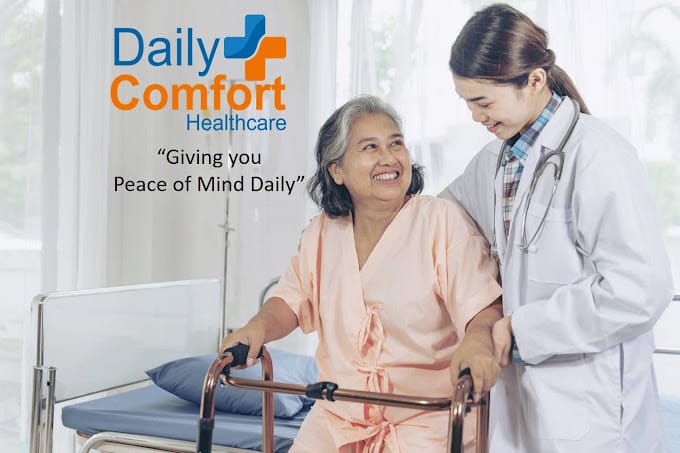 A healthcare professional assisting an elderly woman with a walker.