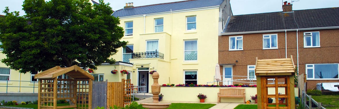 Exterior view of Durnsford Lodge with outdoor space