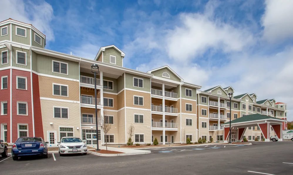 Exterior view of a senior living facility with balconies
