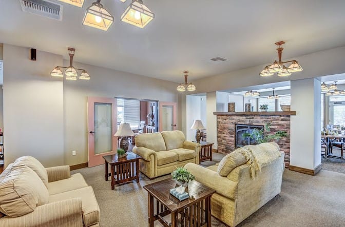 Interior common area with seating and fireplace