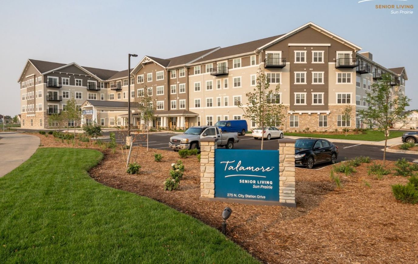 Exterior view of Talamore Senior Living facility with signage