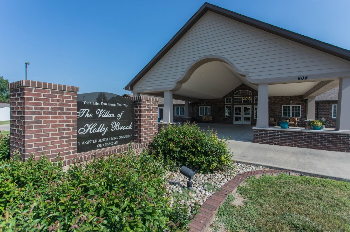 Exterior view of The Villas of Holly Brook facility entrance