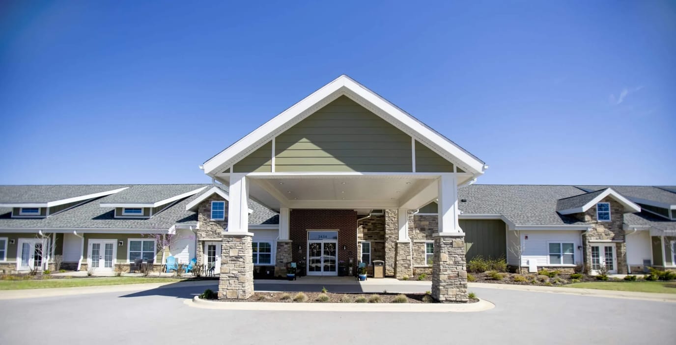 Ciel of Fayetteville, assisted living in Fayetteville, AR — Entrance of a senior living facility with a clear sky