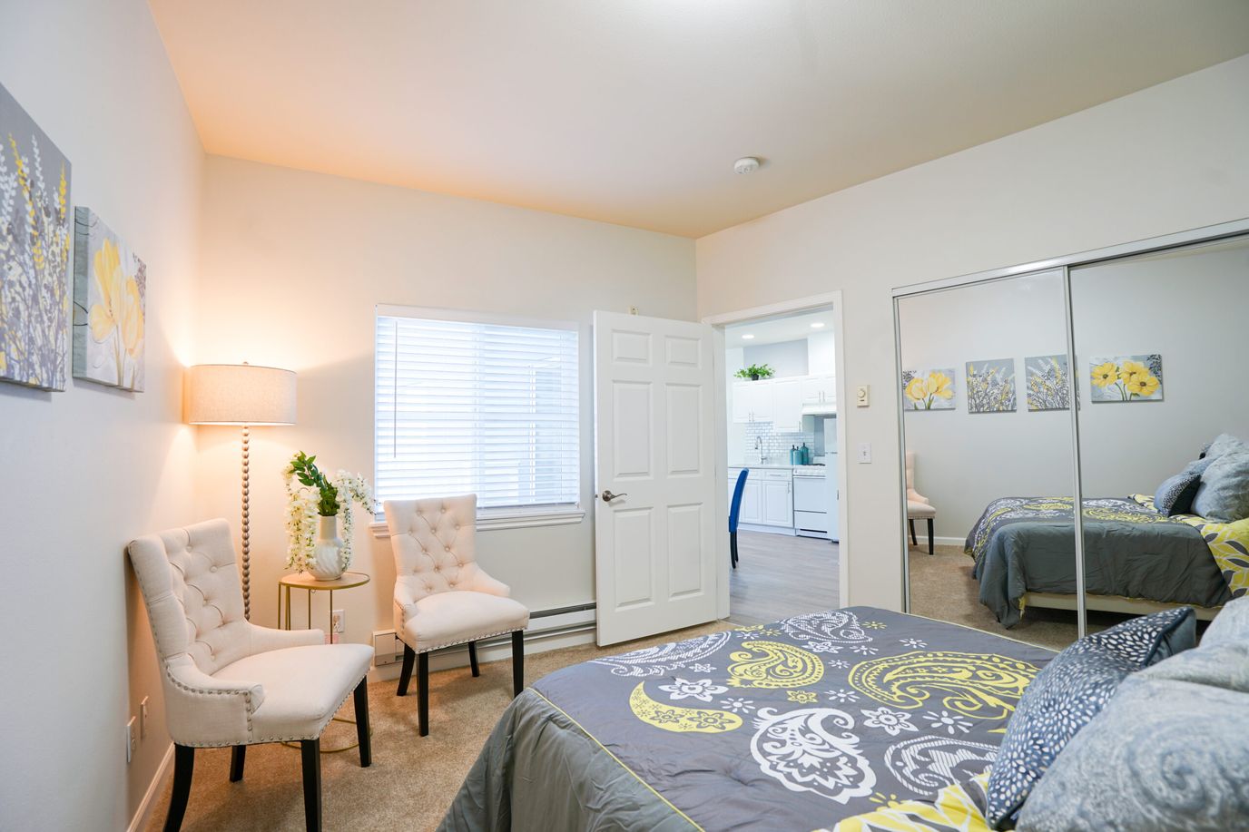 Chateau Valley Center, assisted living in Renton, WA — Comfortable bedroom with decorative elements and natural light