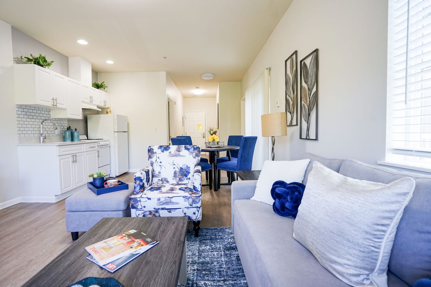 Chateau Valley Center, assisted living in Renton, WA — Bright living area with modern furniture and dining space