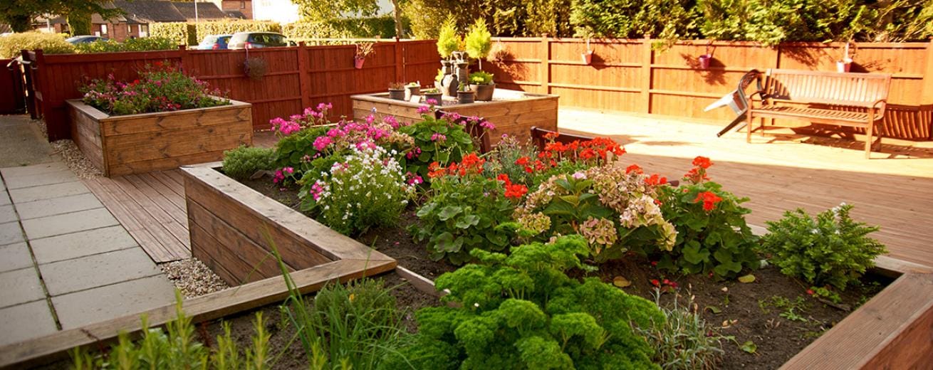 Beautifully landscaped outdoor garden area with flowers.