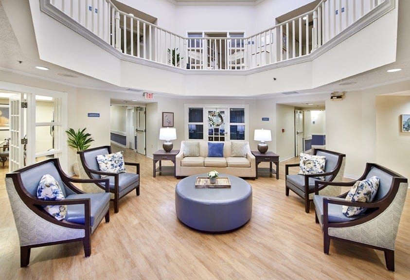 Bright common area with seating and decor