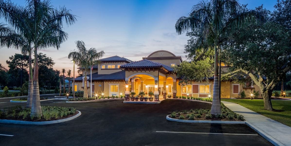 Exterior view of Aravilla Sarasota at dusk