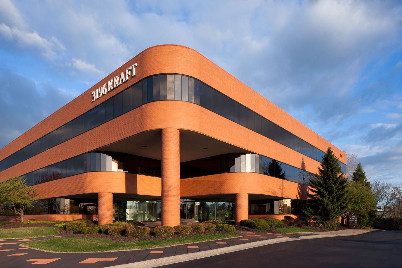 Exterior view of a modern building with landscaping