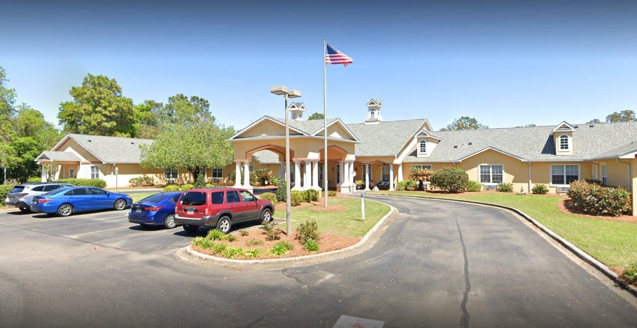 Exterior view of Belvedere Commons with parking area
