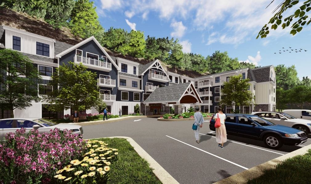 Exterior view of Brightview Harrison with residents and gardens
