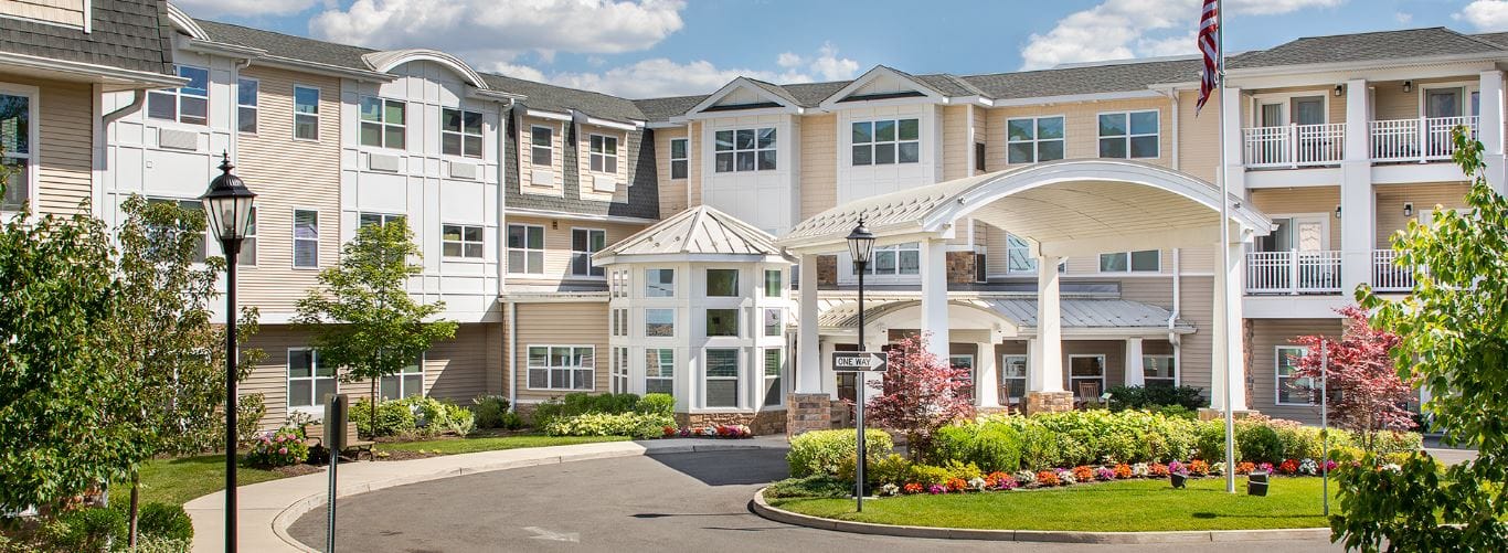Front entrance of Brightview Paramus with landscaping
