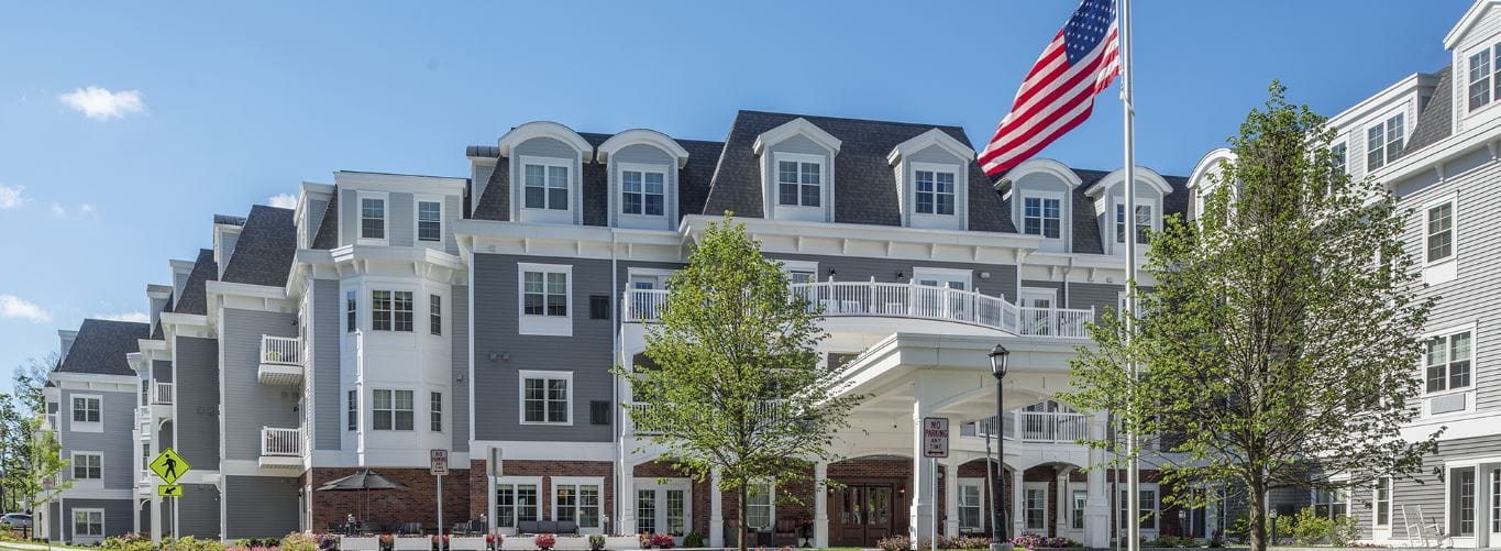 Exterior view of Brightview Wakefield with American flag