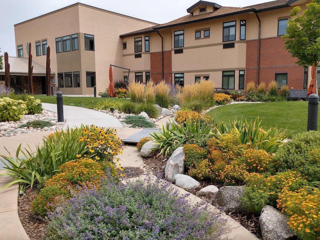 Beautiful garden area surrounding a senior living facility