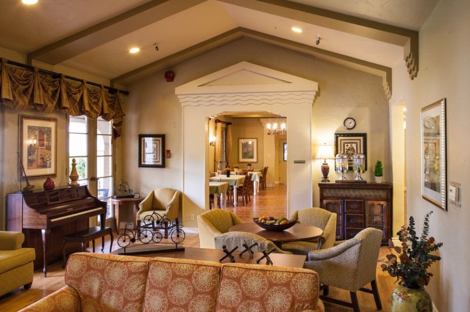 Cozy common area with seating and piano