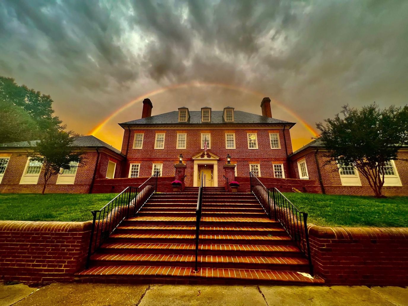 Exterior view of Petersburg Home for Ladies with a rainbow.