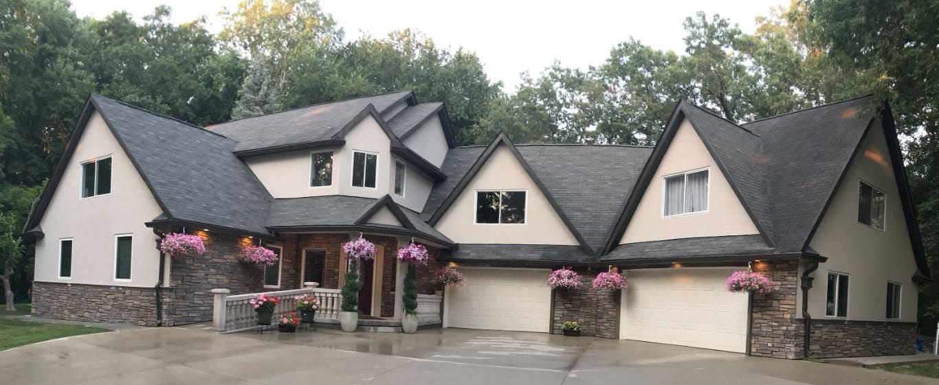 Exterior view of a senior living facility with landscaping