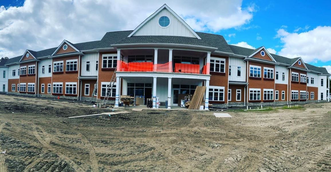 Exterior view of a senior living facility under construction