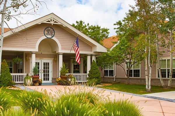 Exterior view of Juniper Village at Aurora with landscaping