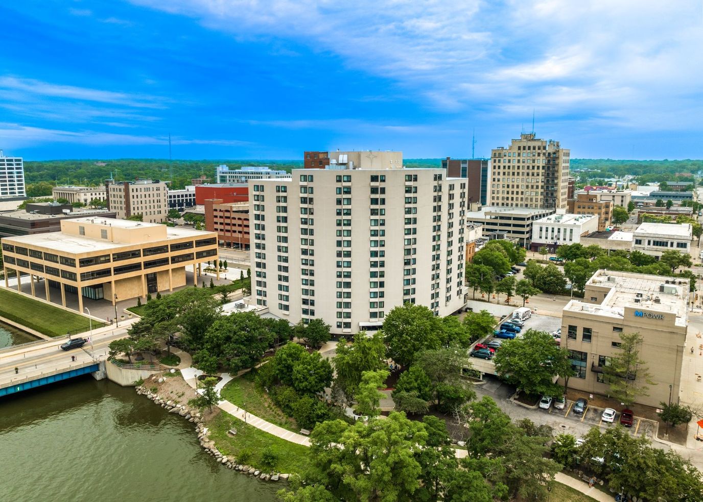 Aerial view of a senior living facility near a river