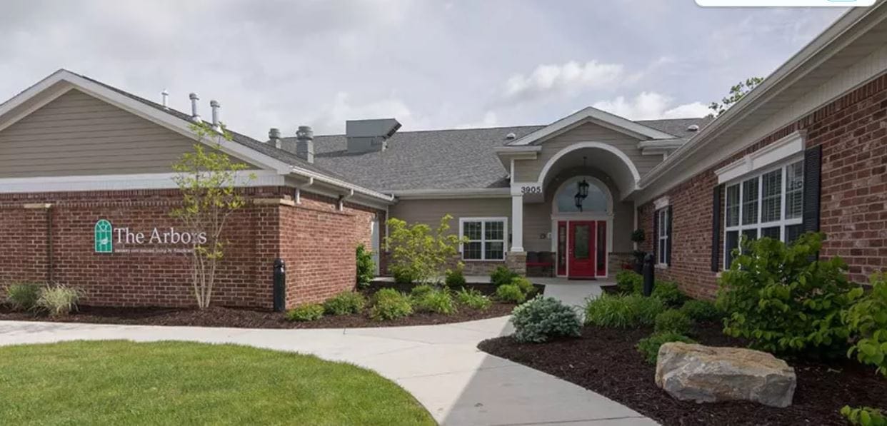 Exterior view of The Arbors senior living facility