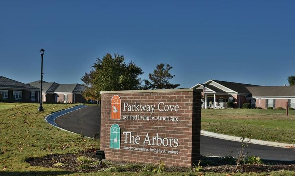 Entrance sign displaying Parkway Cove Assisted Living