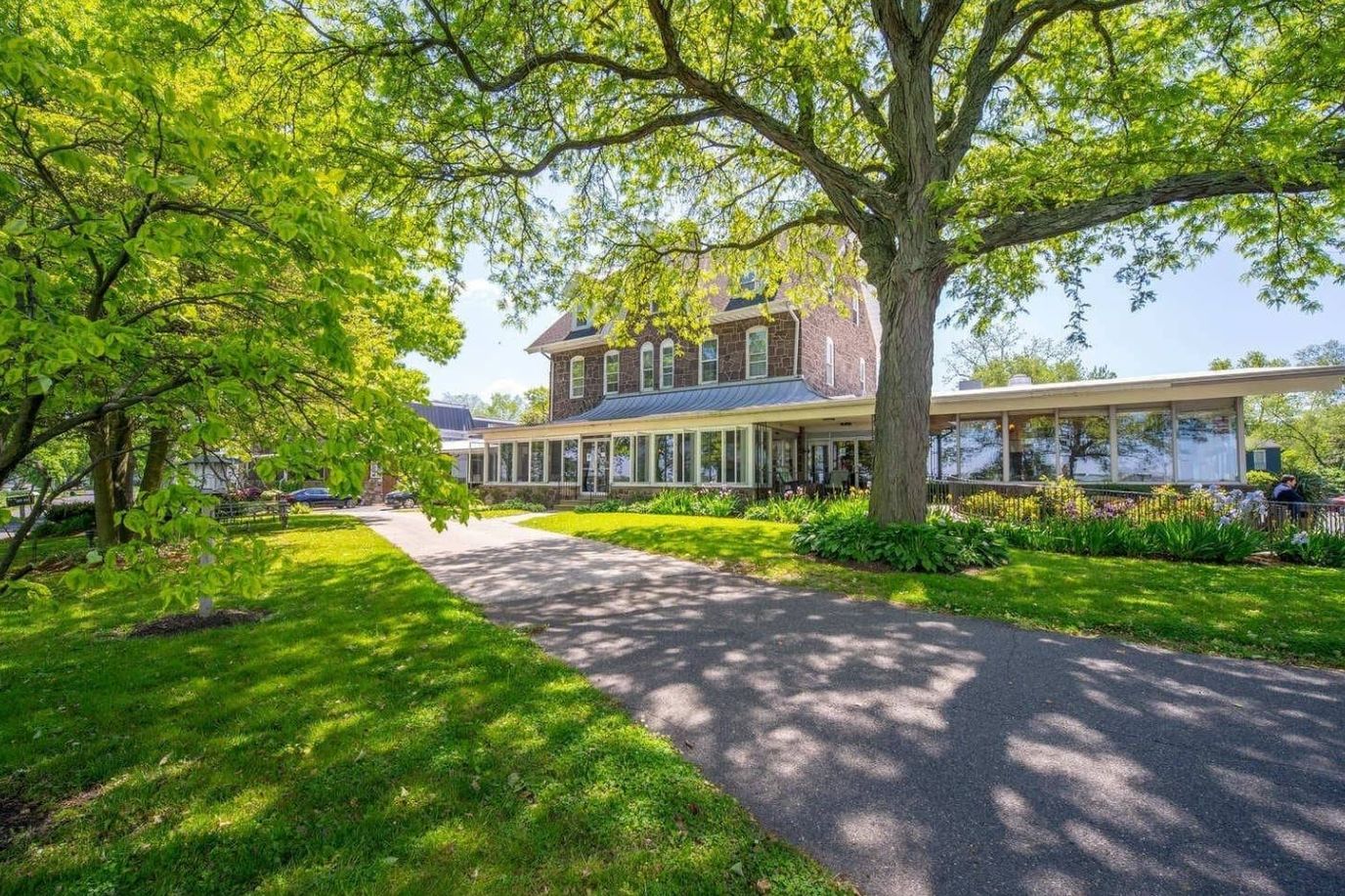 Exterior view of Riverview Estates surrounded by greenery