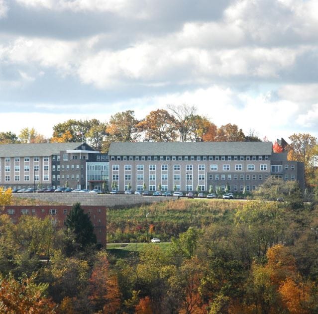 Exterior view of Rosshill Retirement Residence in autumn
