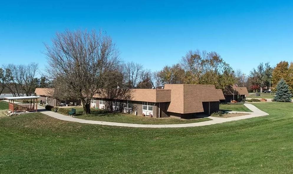 Exterior view of Sabetha Manor surrounded by green space