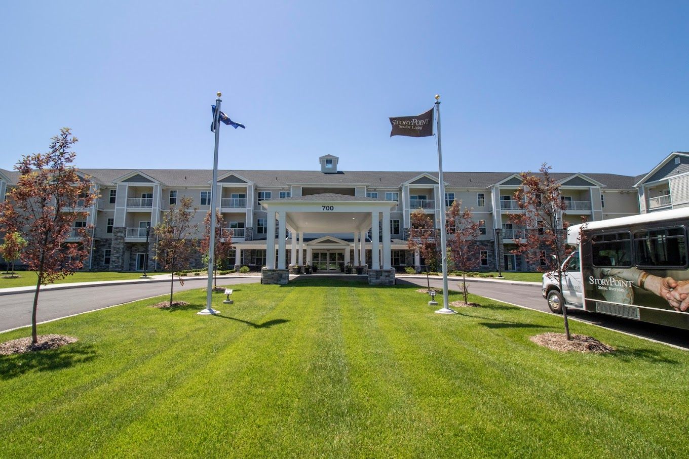 Front entrance of StoryPoint Chesterton with landscaping and signage
