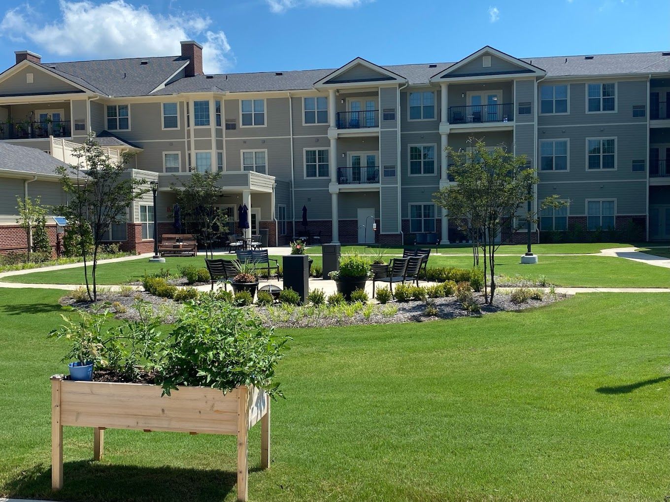 Outdoor space with seating near the facility building