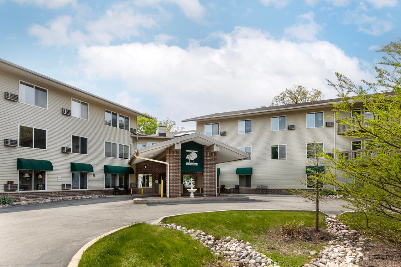 Exterior view of The Arboretum Senior Living entrance