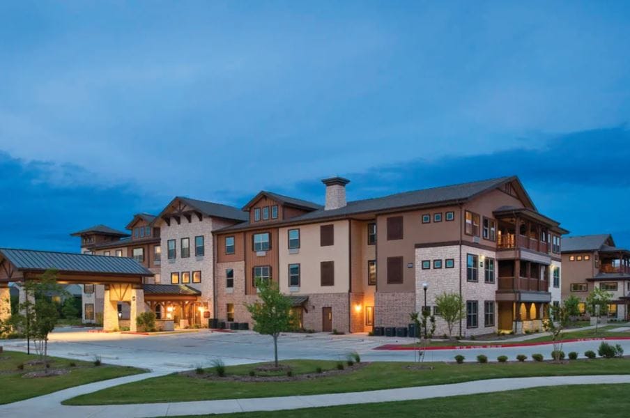 Exterior view of The Isle at Cedar Ridge at twilight