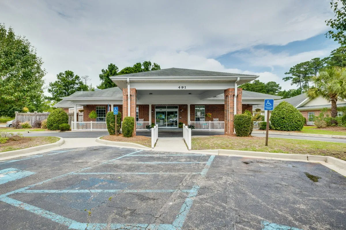 Front view of the assisted living facility with accessible parking