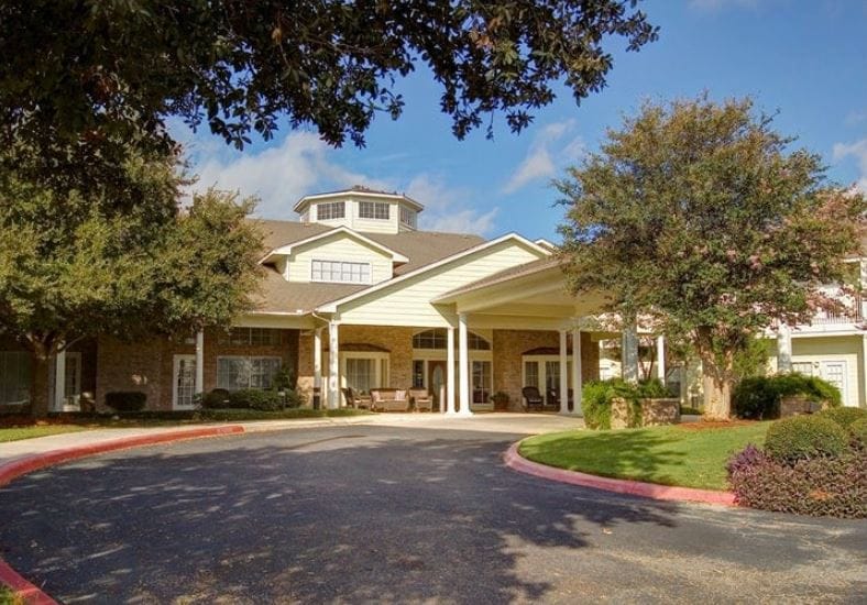 Exterior view of the facility showing entrance and landscaping