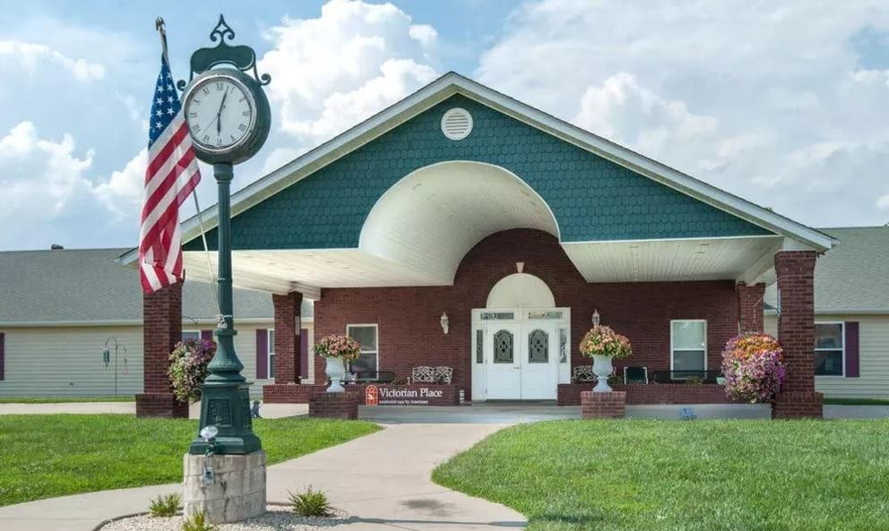 Exterior view of the Victorian Place facility with clock