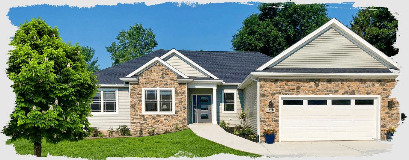 Exterior view of a residential building with lawn