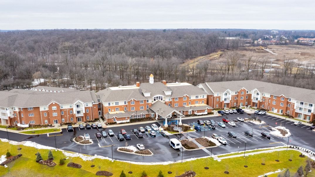 Aerial view of Willow Pines Retirement Community building and parking lot