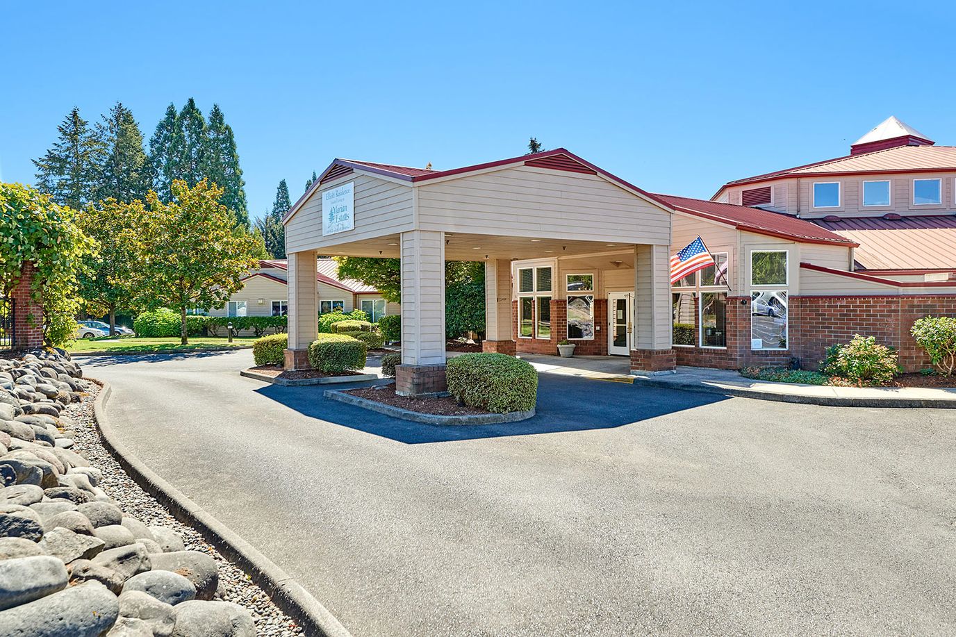 Front entrance of Marquis Marian Estates with landscaping