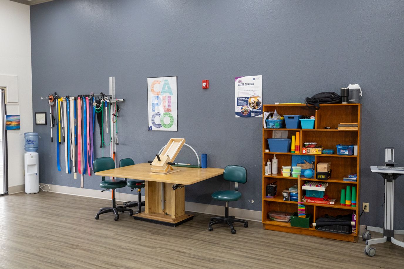Activity area with equipment arranged on the walls