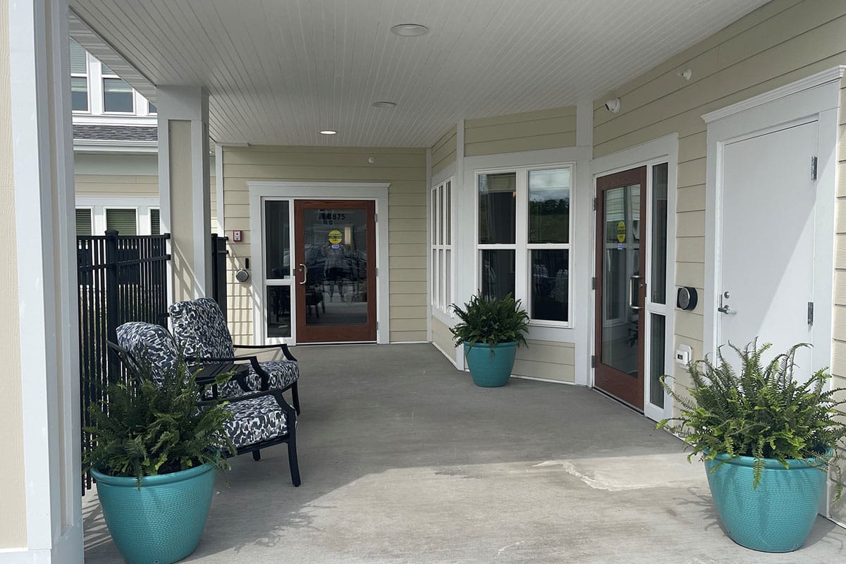Entrance area with seating and potted plants
