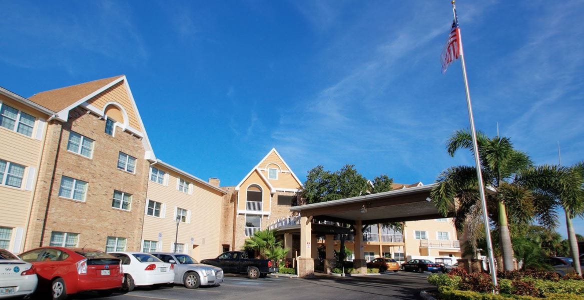 Exterior view of Bayside Terrace with parking area