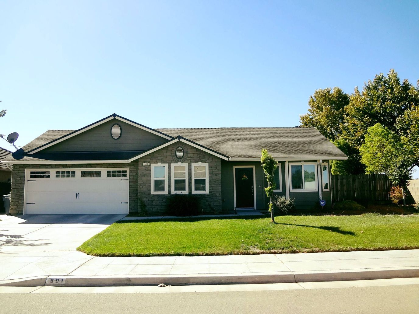 Exterior view of a well-maintained assisted living facility