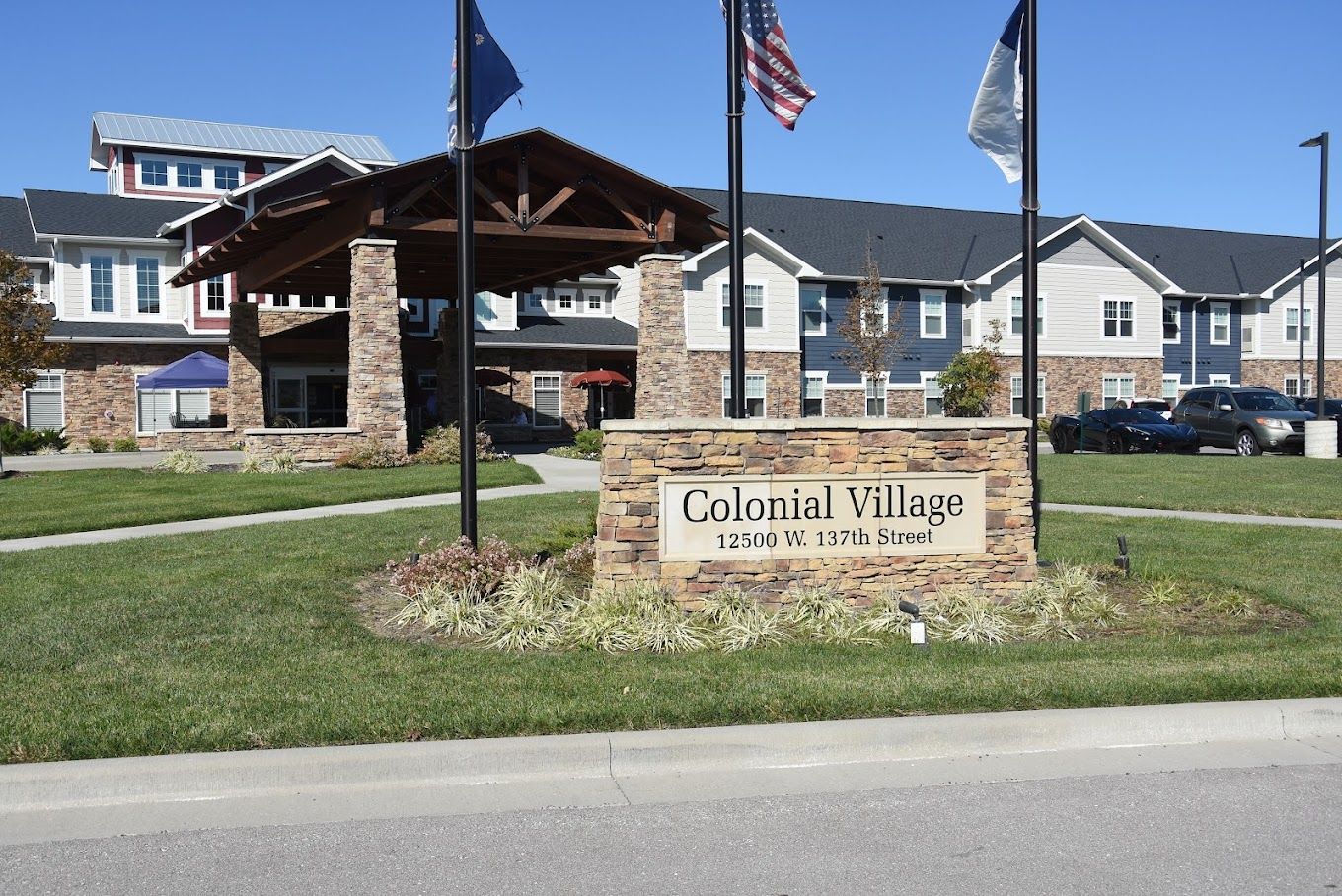 Exterior view of Colonial Village building and entrance
