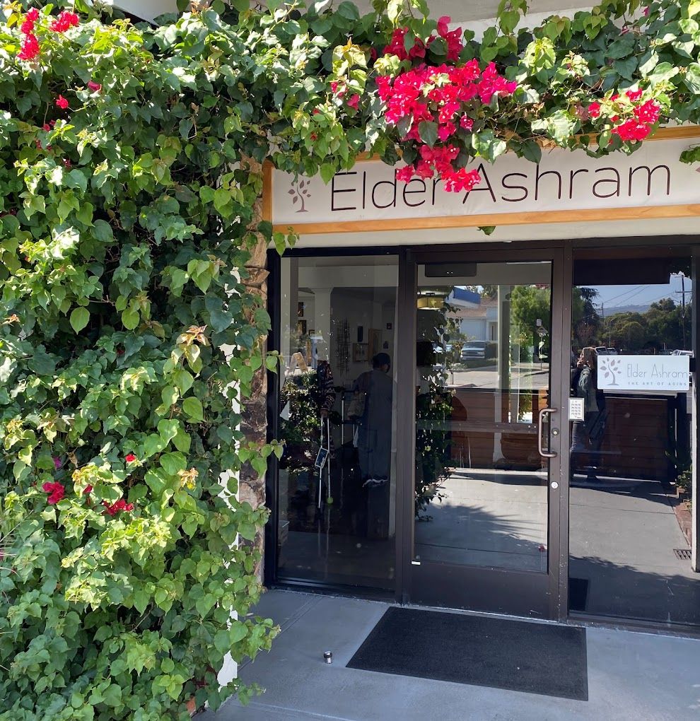 Entrance of Elder Ashram with flowering plants